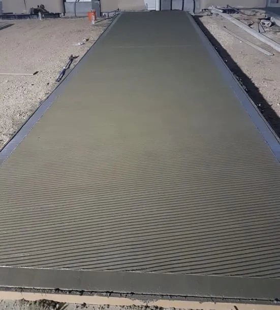 Freshly poured grooved concrete slab in a commercial interior by Concrete Star Calgary