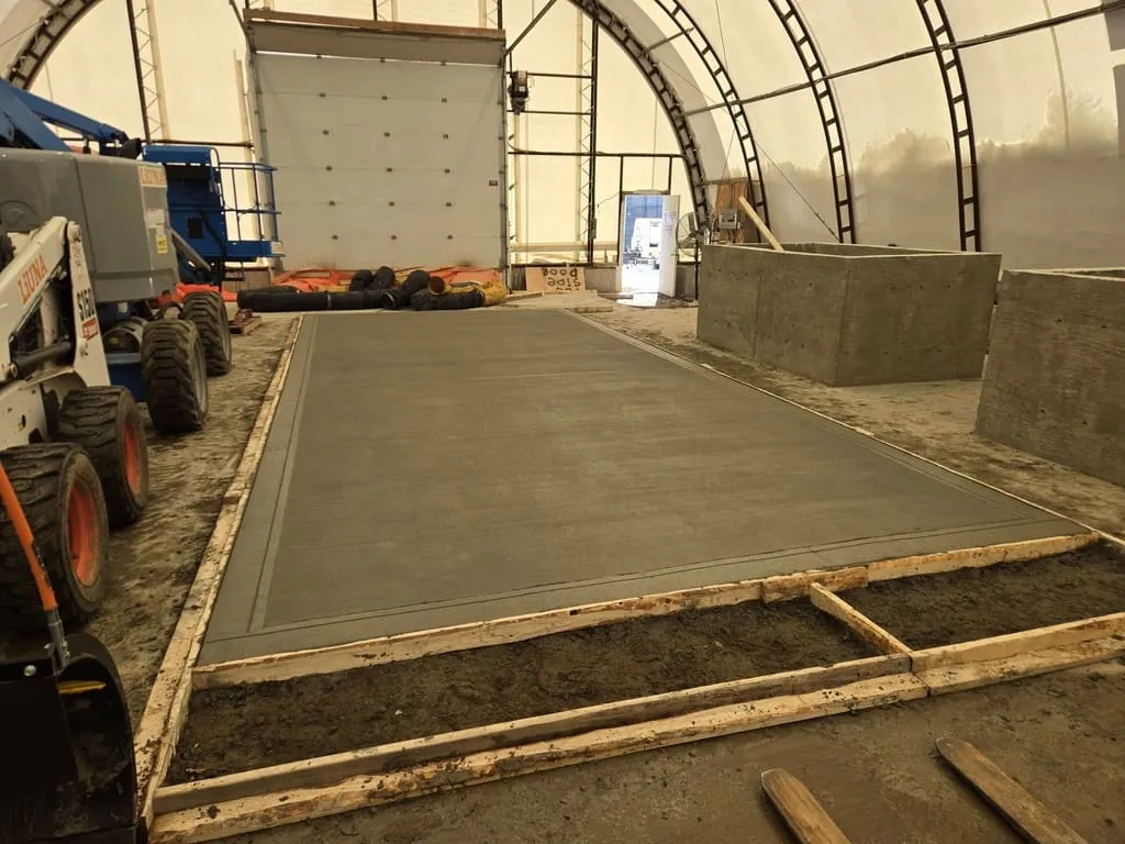 Newly replaced commercial garage floor in an industrial workshop