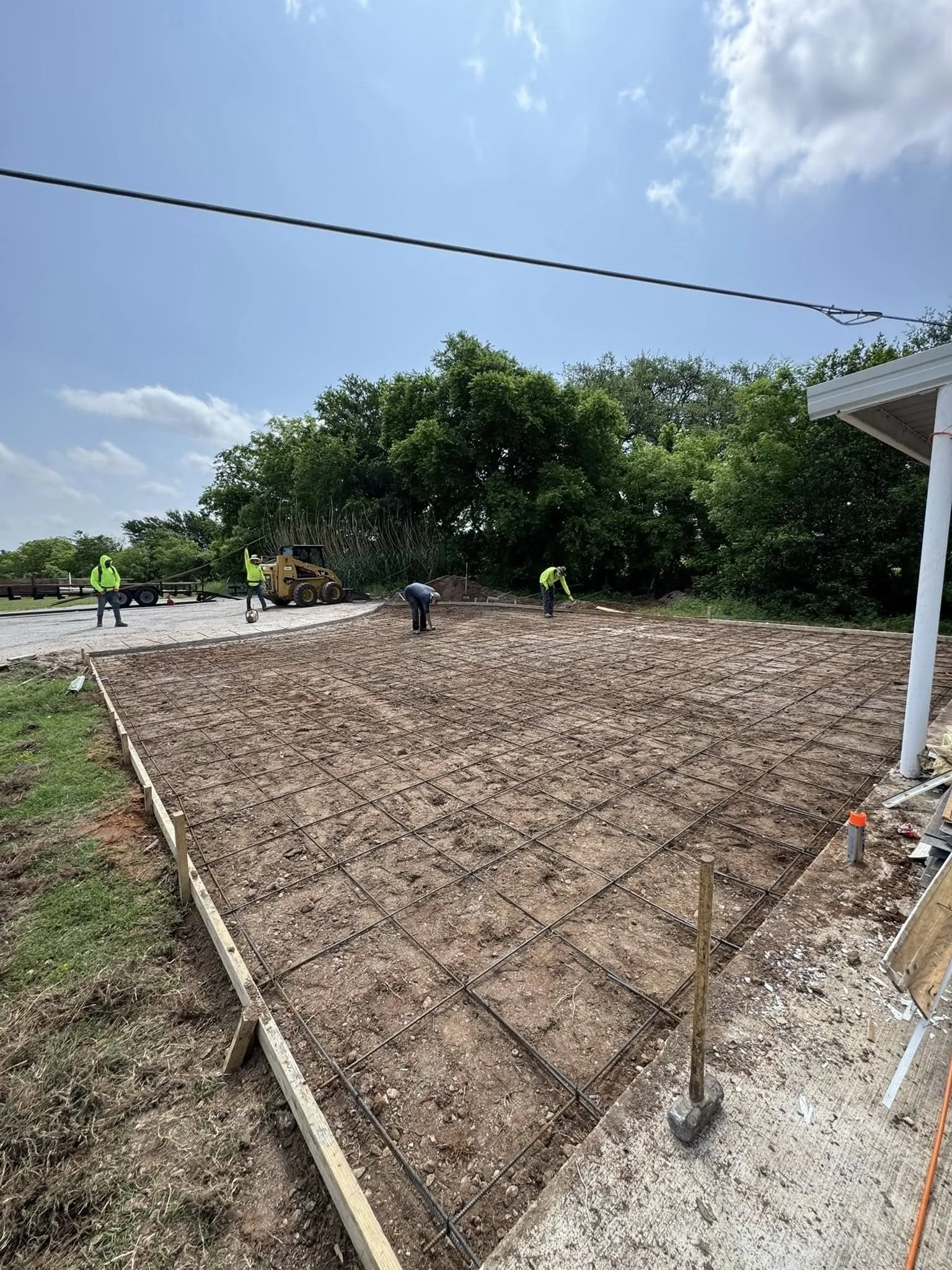 Rebar grid preparation for a concrete patio foundation by Concrete Star Calgary