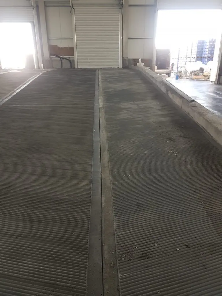 grooved-ramp-inside-building Concrete loading ramp with grooved finish inside a commercial building by Concrete Star Calgary