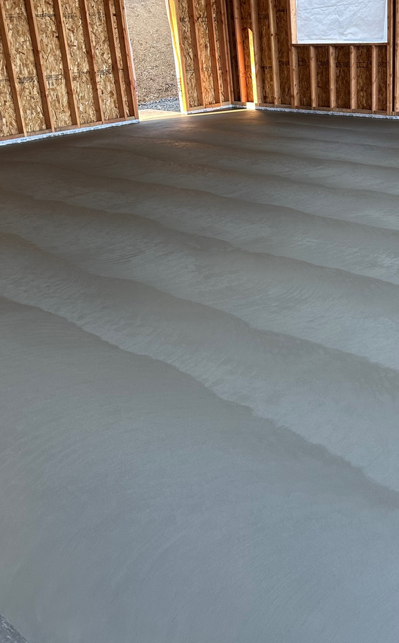 New concrete garage floor poured during construction in Calgary by Concrete Star