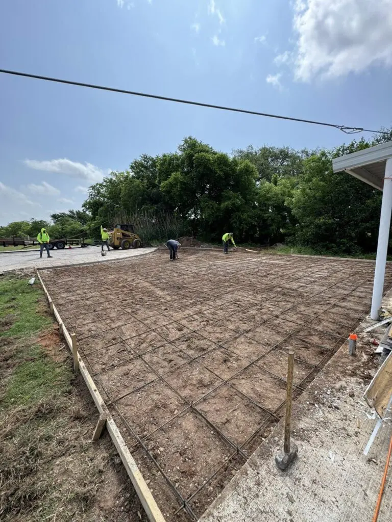 patio-rebar-grid-prep Rebar grid preparation for a concrete patio foundation by Concrete Star Calgary